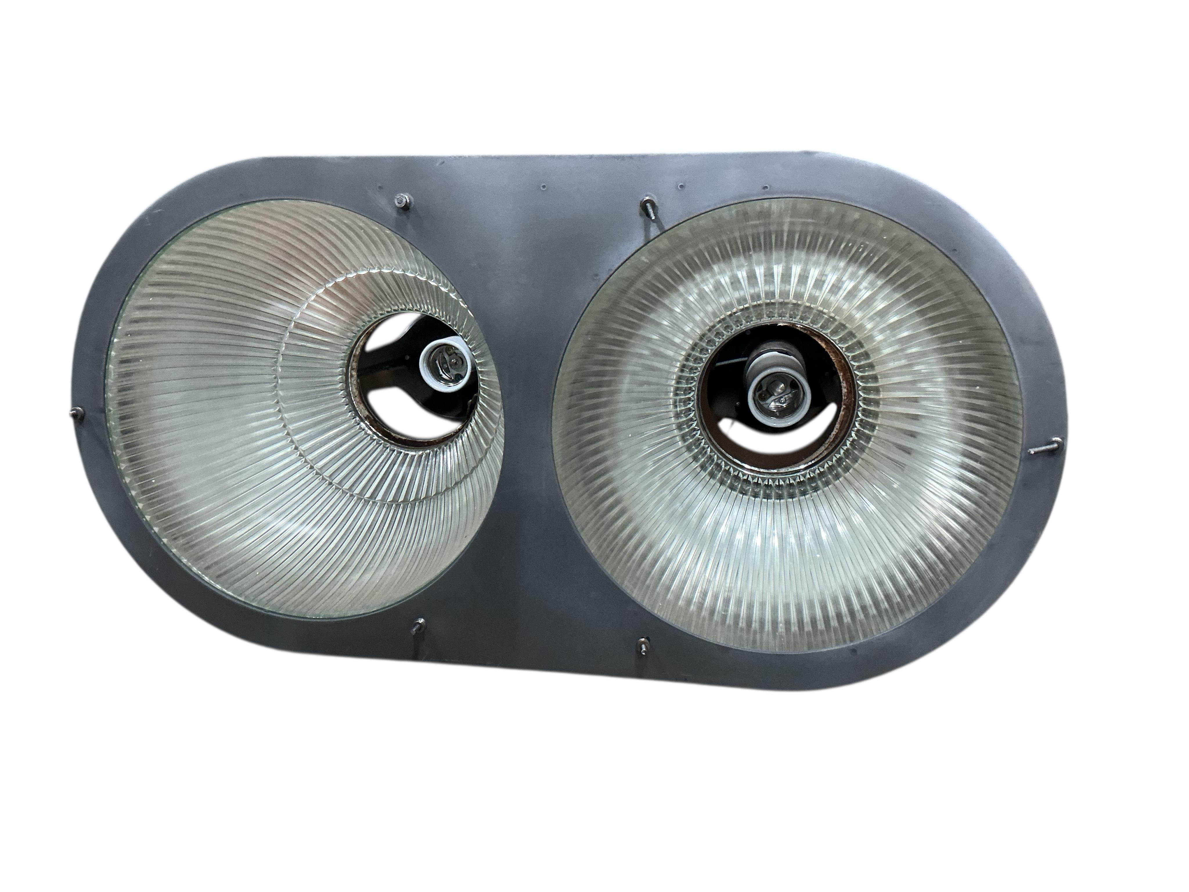 A pair of Holophane double industrial factory lights, width 64cm, height 42cm